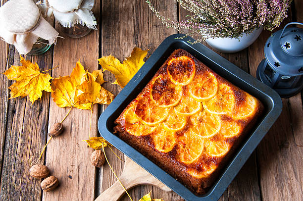 istock Delicious orange cake for autumn. Rustic decorations 621844318