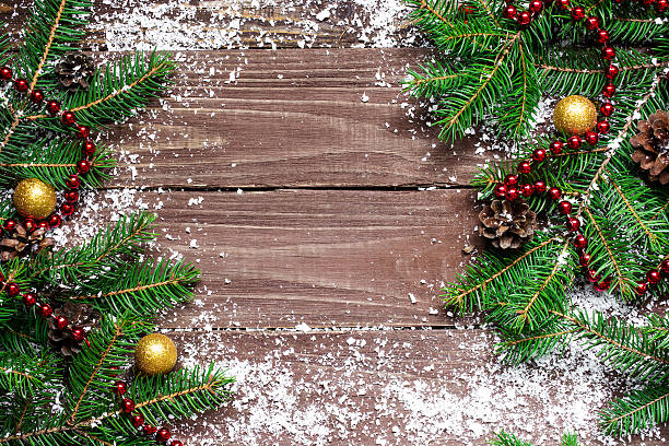 istock christmas fir tree branches with decorations 621844424