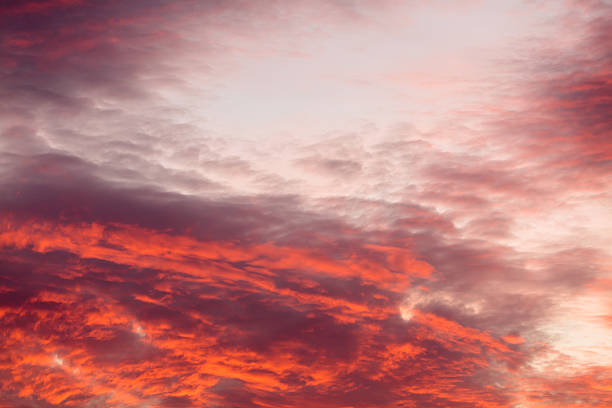 istock Colorful warm clouds on sky at sunset 621845270