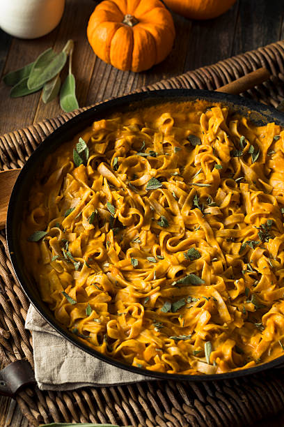 istock Homemade Autumn Pasta with Pumpkin Sauce 621848194