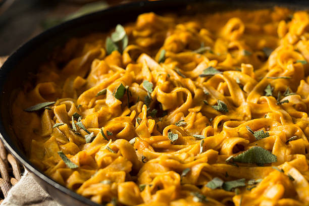 istock Homemade Autumn Pasta with Pumpkin Sauce 621848830