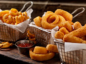 Baskets of Onion Rings, Curly Fries and Cheese Sticks