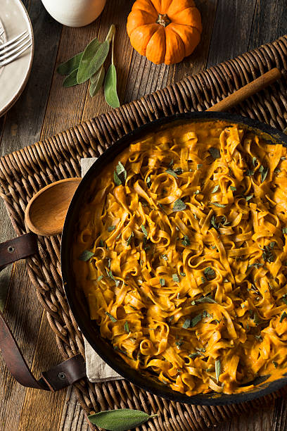 istock Homemade Autumn Pasta with Pumpkin Sauce 621850972