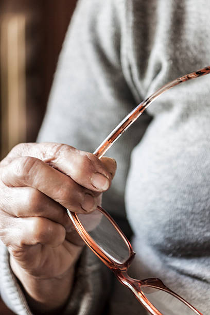 istock Holding glasses with the hand 621851234