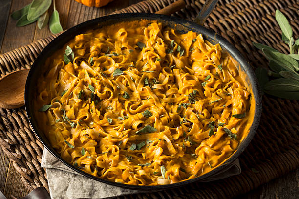 istock Homemade Autumn Pasta with Pumpkin Sauce 621851926