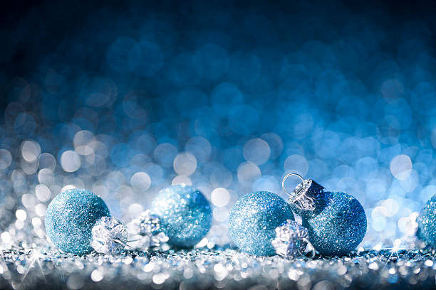 istock Christmas ornaments on defocused lights. Decorations Bokeh Blue White 621852066