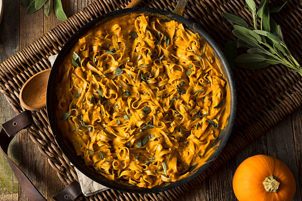 istock Homemade Autumn Pasta with Pumpkin Sauce 621852254