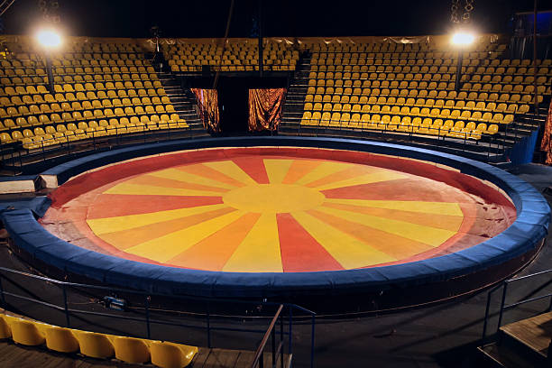 istock Circus ring and chairs for people 621854336