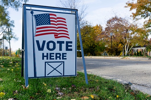 A sign indicates where people can vote on Election Day.