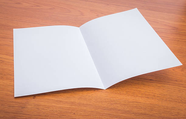 istock Blank paper on wooden background 621856212