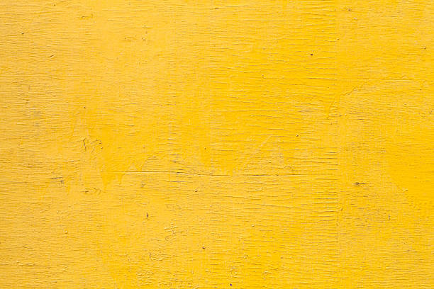 istock Bright yellow wooden wall texture 621856274