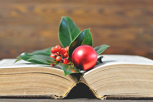 istock Christmas background with Christmas decoration and old book 621857076