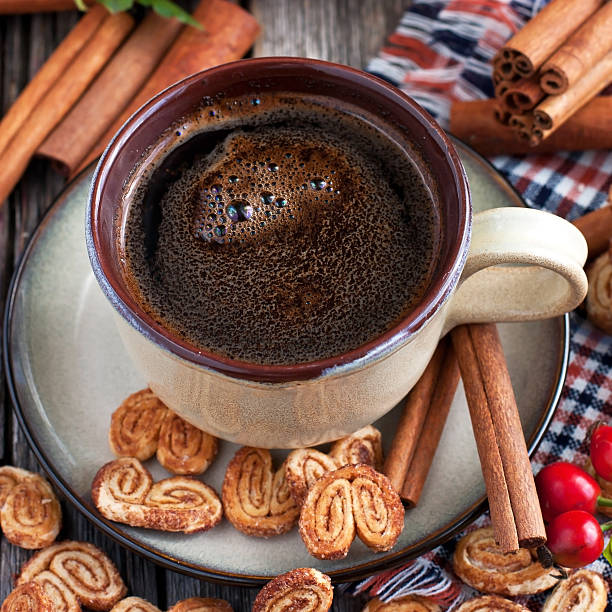 istock Cup of coffee with cookies 621858368
