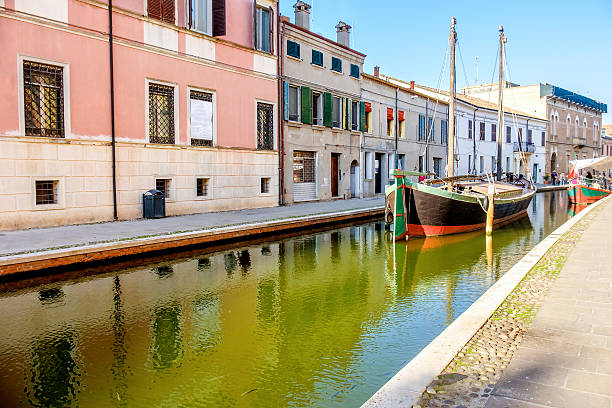 istock boat canal colorful italian village Comacchio Emilia Romagna Italy 621860592