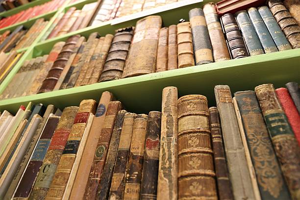 istock Old books in a bookshelf 621894958