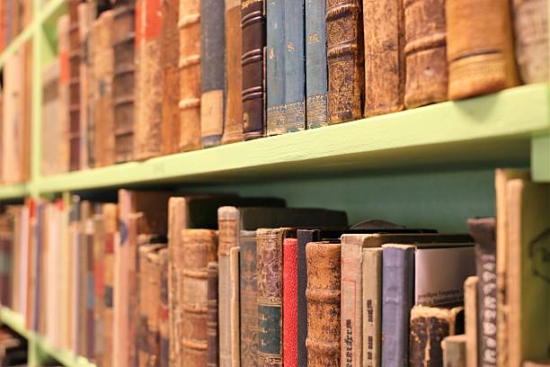 istock Old books in a bookshelf 621895016
