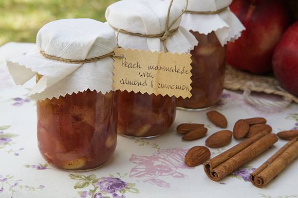 istock Homemade peach marmalade with almond nuts and cinnamon 621896076