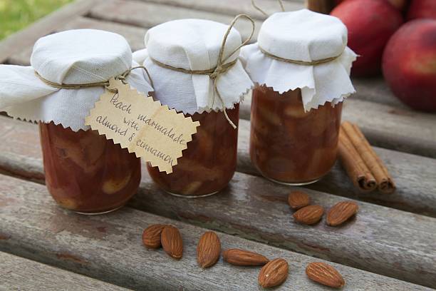istock Homemade peach marmalade with almond nuts and cinnamon 621896166