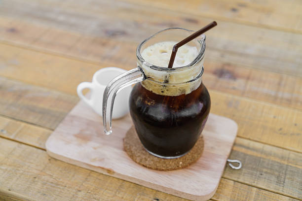 istock Iced cold coffee on a wooden table 621896964