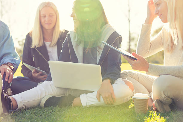 istock Close up of 3 girls using computers 621897202