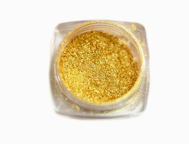istock Gold glitter, shiny eyeshadows. Brilliant glitter nail design on 621898092