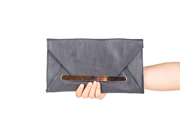 istock Woman Hand Holding Hand Bag 621900688
