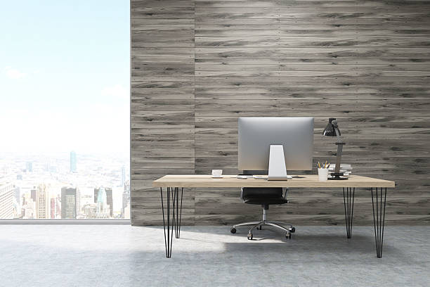 istock CEO working desk in office with wooden panels 621901180