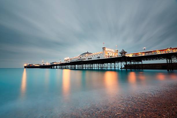 Brighton Pier Brighton, United Kingdom - October 24, 2016: Brighton Marine Palace and Pier is popular tourist attraction, which opened in 1899.  east sussex photos stock pictures, royalty-free photos & images