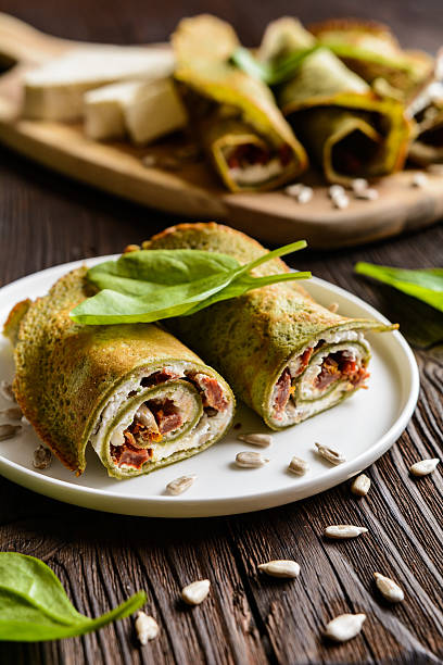 istock Spinach pancakes stuffed with Feta, curd and sun dried tomato 621901954
