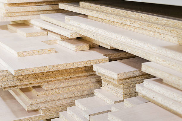 board chipboard cut parts board chipboard cut parts for furniture production close-up pressboard stock pictures, royalty-free photos & images