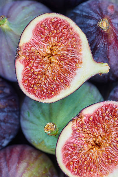 istock Fresh fig fruits on a wooden table 621902808