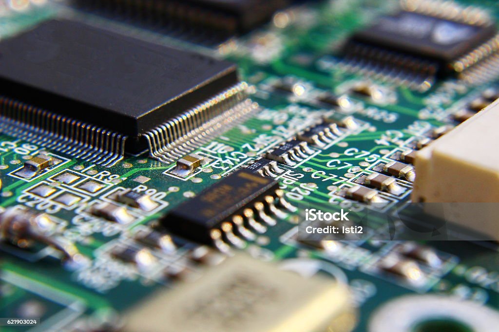Printed Circuit Components. Printed Circuit Board with many electrical components. Manufacturing Stock Photo