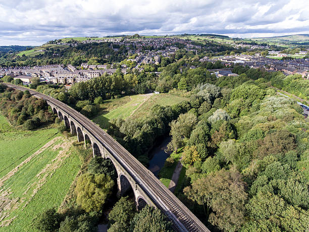 istock Views over New Mills, Derbyshire with railway bridge 621904180