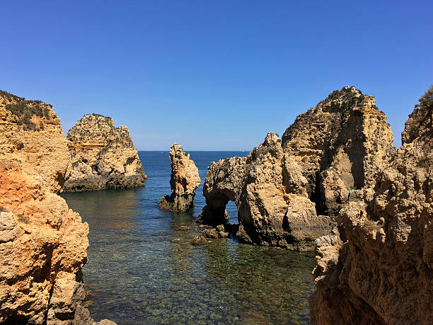 istock Rocky outcroppings surrounded by low tide 621904286