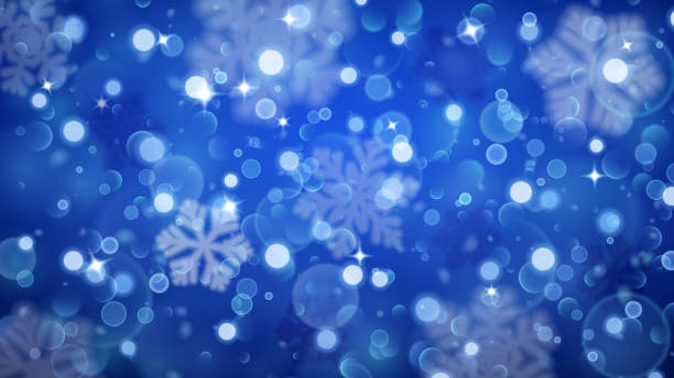 istock Christmas background of fuzzy and blurred snowflakes 621908314