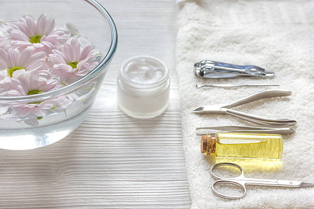 istock oil and cream for nail care in spa 621908916