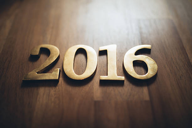 istock New year 2016 gold text on wood 621909266