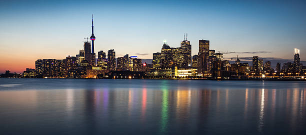 istock Toronto financial district cityscape illuminated at night 621909700