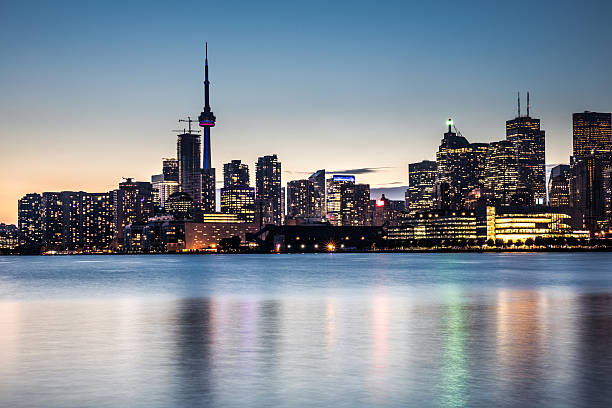 istock Toronto financial district cityscape illuminated at night 621909900