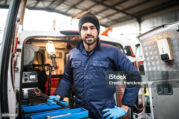 Mechanic Technician On A Garage Stock Photo - Download Image Now - Plumber, Craftsperson, Portrait