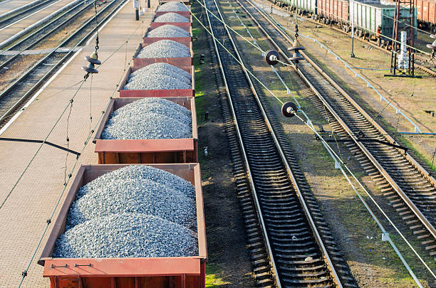 istock cars with stones on the railway 621914316
