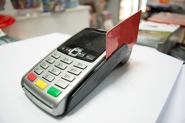 POS Terminal with a credit card.