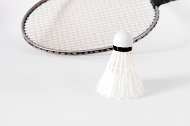 istock the white Badminton shuttlecock and racket on white background 621920000