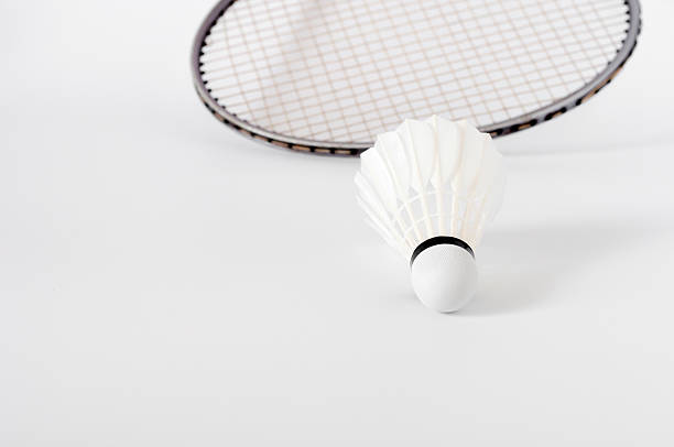 istock the white Badminton shuttlecock and racket on white background 621920038