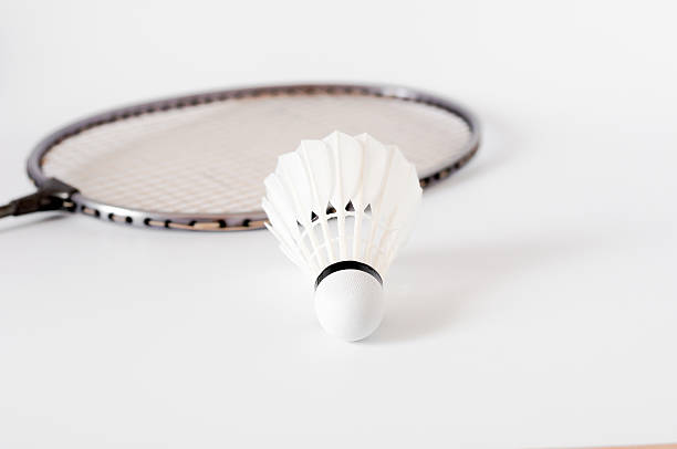 istock the white Badminton shuttlecock and racket on white background 621920040