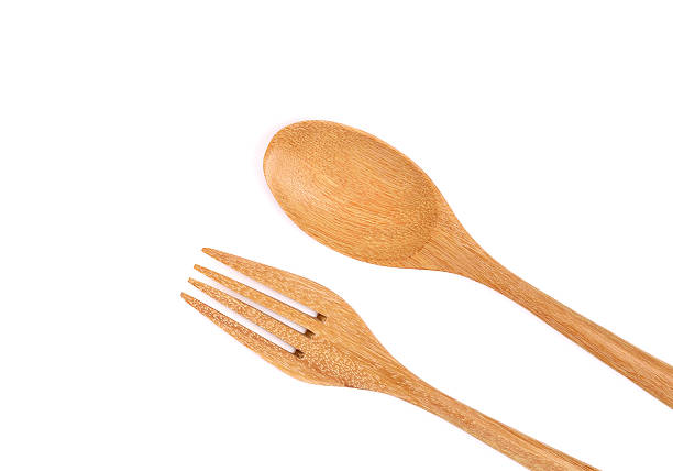 istock Wooden Spoon and Fork on white blockground 621920600