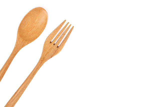 istock Wooden Spoon and Fork on white blockground 621920612