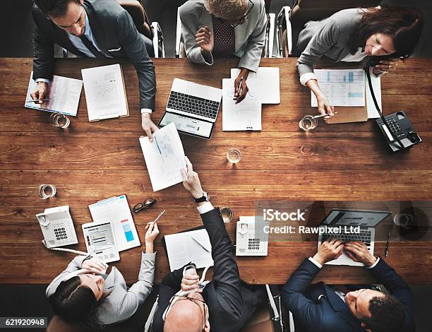 Business People Analyzing Statistics Financial Concept Stock Photo - Download Image Now