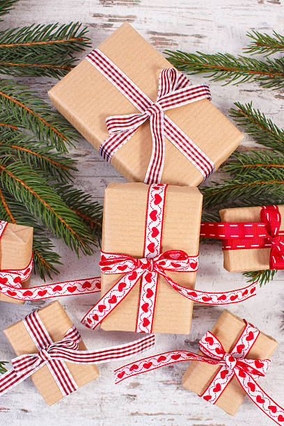 istock Wrapped gifts and spruce branches for Christmas or Valentines 621923288
