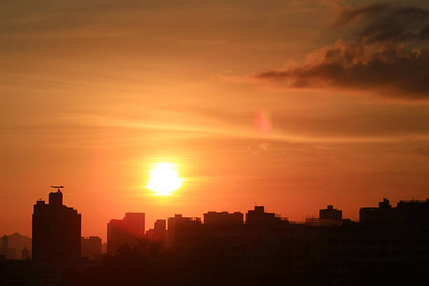 istock Sunset hk with building silhouette 621924264